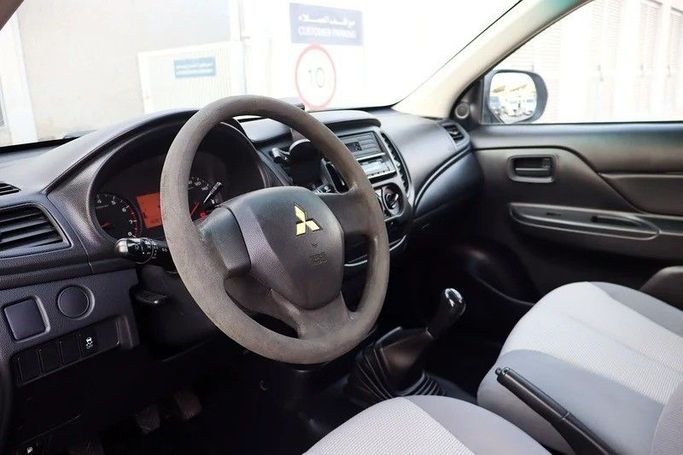 Used Mitsubishi L200 V Facelift, 2.4 l, 2020 in Sharjah by Al Rukin Al Saudi, White color. GCC Specs | AUTO.AE