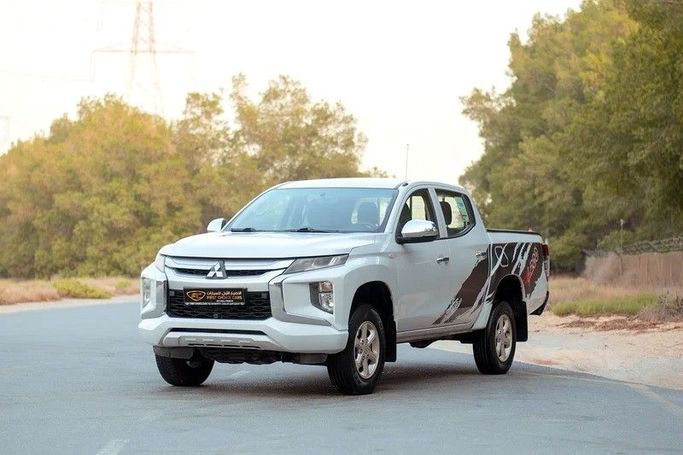 Used Mitsubishi L200 V Facelift, 2.4 l, 2020 in Sharjah by First Choice Cars, White color. GCC Specs | AUTO.AE