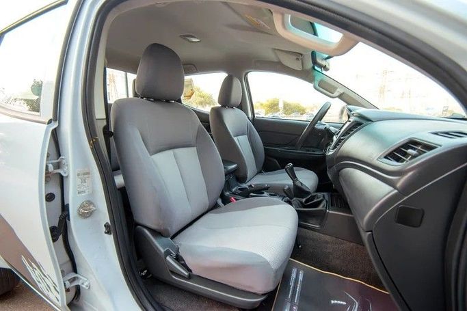 Used Mitsubishi L200 V Facelift, 2.4 l, 2020 in Sharjah by First Choice Cars, White color. GCC Specs | AUTO.AE