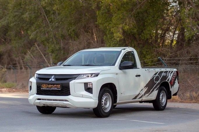 Used Mitsubishi L200 V Facelift, 2.4 l, 2021 in Sharjah by First Choice Cars, White color. GCC Specs | AUTO.AE