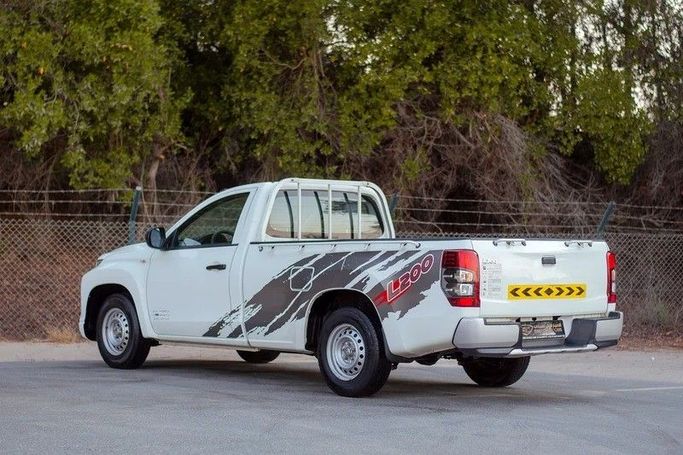 Used Mitsubishi L200 V Facelift, 2.4 l, 2021 in Sharjah by First Choice Cars, White color. GCC Specs | AUTO.AE