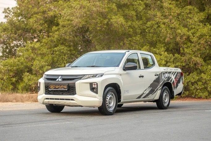 Used Mitsubishi L200 V Facelift, 2.4 l, 2021 in Sharjah by First Choice Cars, White color. GCC Specs | AUTO.AE