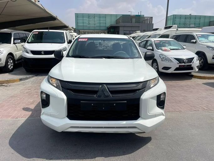 Подержанный Mitsubishi L200 V Рестайлинг, 2.4 л, 2021 в ОАЭ, Шарджа от Al Nabeel Used Cars Белый цвет. GCC | AUTO.AE | Объявление #279023