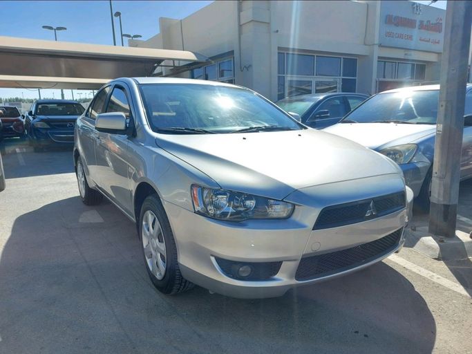 Used Mitsubishi Lancer X Facelift, 1.6 l, 2013 in Sharjah by Al Qanaah Used Cars, Silver color. GCC Specs | AUTO.AE