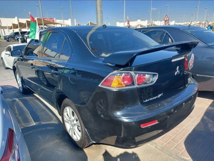 Used Mitsubishi Lancer X Facelift 2, 2.0 l, 2016 in Sharjah by Al Qanaah Used Cars, Black color. GCC Specs | AUTO.AE