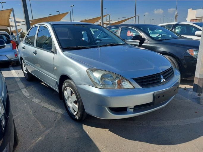 Used Mitsubishi Lancer IX Facelift, 2.0 l, 2010 in Sharjah by Al Qanaah Used Cars, Silver color. GCC Specs | AUTO.AE