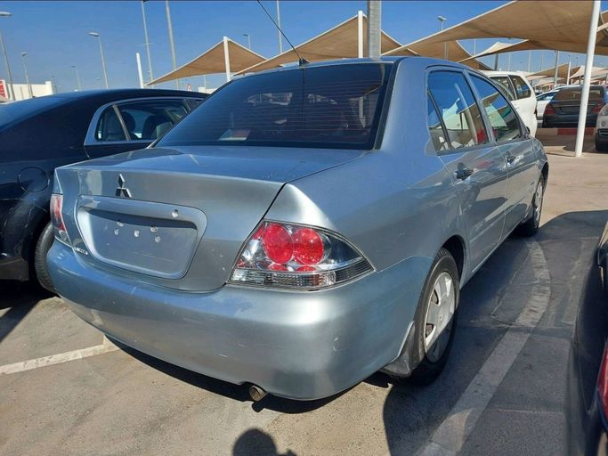 Used Mitsubishi Lancer IX Facelift, 2.0 l, 2010 in Sharjah by Al Qanaah Used Cars, Silver color. GCC Specs | AUTO.AE