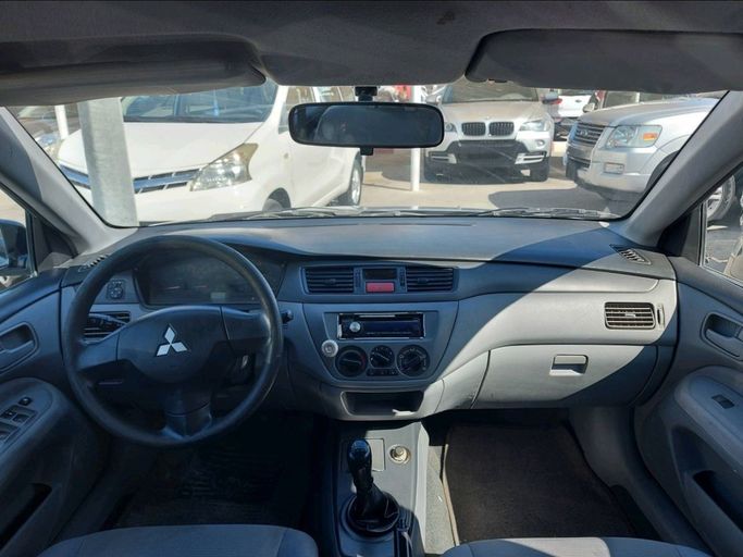 Used Mitsubishi Lancer IX Facelift, 2.0 l, 2010 in Sharjah by Al Qanaah Used Cars, Silver color. GCC Specs | AUTO.AE