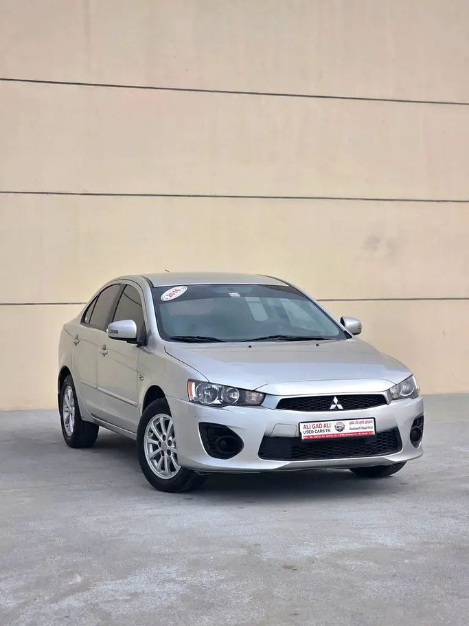 Подержанный Mitsubishi Lancer X Рестайлинг 2, 2.0 л, 2016 в Шардже от Ali Gad Ali Used Cars Серый цвет. GCC | AUTO.AE