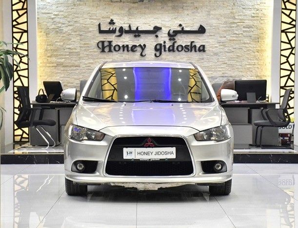 مستعملة Mitsubishi Lancer فيس ليفت X, 2.4 l, 2015 في في الشارقة من Honey Jidosha Used Cars Tr.، اللون فضي. مواصفات الخليج | AUTO.AE | إعلان #253933