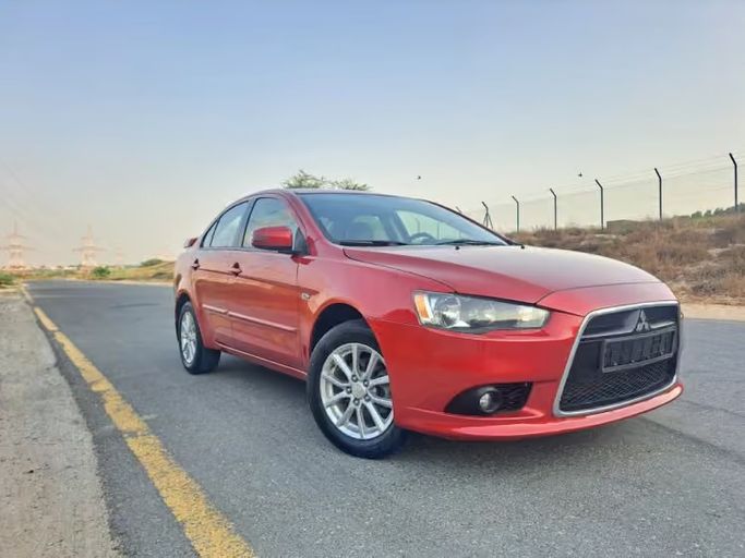 مستعملة ⁦Mitsubishi Lancer فيس ليفت X، 1.6 l، 2015⁩ في في الإمارات, الشارقة من Wahat Al Umra Used Cars، اللون أحمر. مواصفات الخليج | AUTO.AE | إعلان #289458