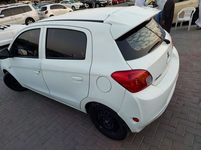 Used Mitsubishi Mirage VI, 1.2 l, 2014 in Sharjah by Al Aqsa Used Cars, White color. GCC Specs | AUTO.AE