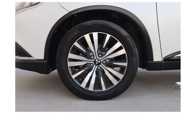 Подержанный Mitsubishi Outlander III Рестайлинг 3, 2.4 л, 2020 в Шардже от Al Sayed Khamis Used Cars Белый цвет. GCC | AUTO.AE