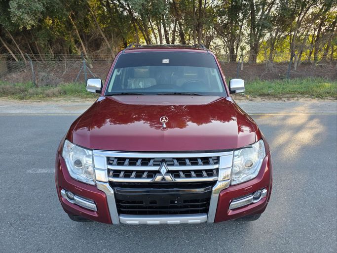Новый Mitsubishi Pajero IV Рестайлинг 2, 3.5 л, 2016 в Шардже от Al Mina Used Cars Тёмно-бордовый цвет. GCC | AUTO.AE