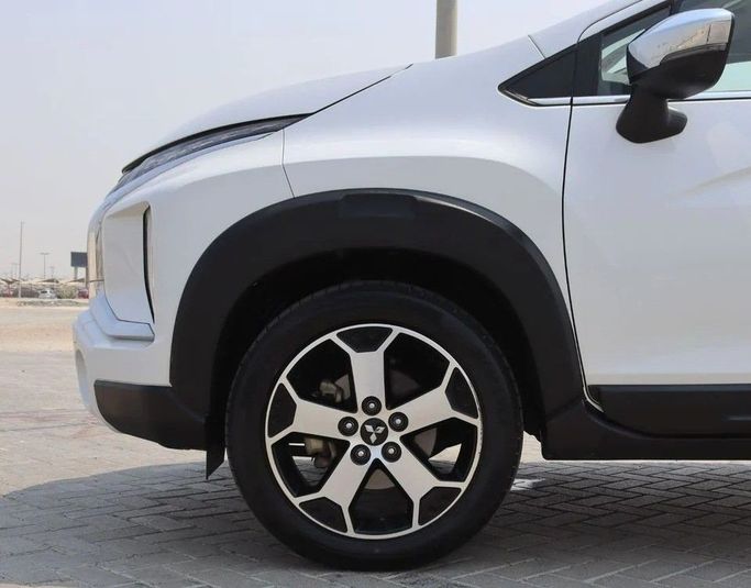 Подержанный Mitsubishi Xpander I, 1.5 л, 2023 в Шардже от Al Sayed Khamis Used Cars Белый цвет. GCC | AUTO.AE