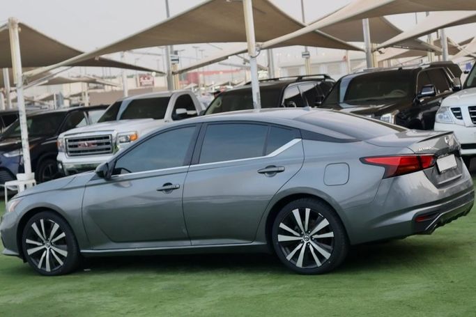 Подержанный Nissan Altima VI (L34), 2.5 л, 2022 в Шардже от Al Bake Used Cars Серый цвет.  | AUTO.AE