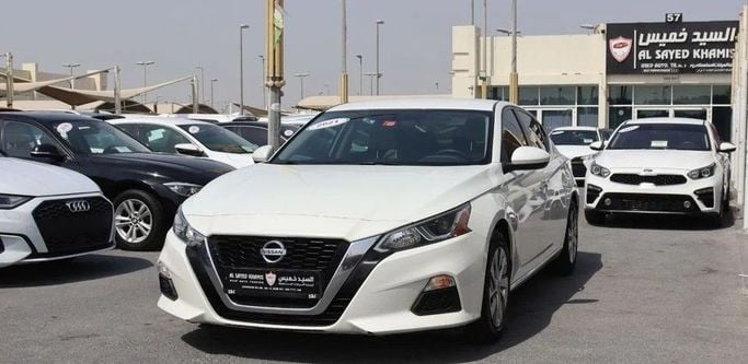 Подержанный Nissan Altima VI (L34), 2.5 л, 2021 в Шардже от Al Sayed Khamis Used Cars Белый цвет. GCC | AUTO.AE
