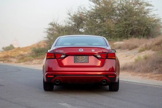 Used Nissan Altima VI (L34), 2.5 l, 2022 in Sharjah by First Choice Cars, Red color. GCC Specs | AUTO.AE