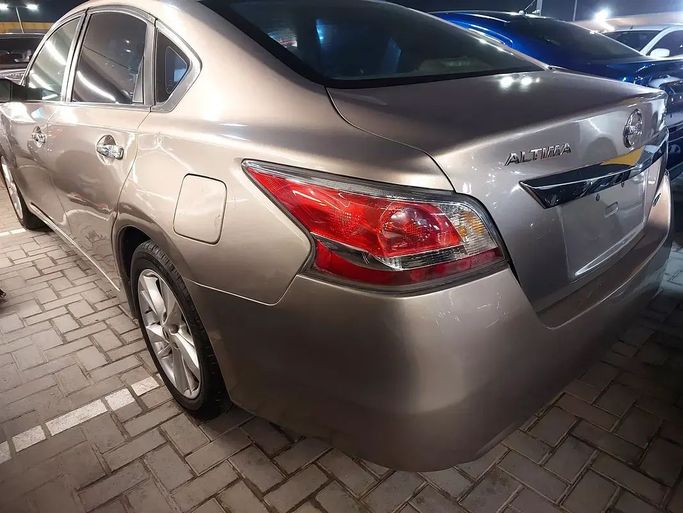 Used Nissan Altima V (L33), 2.5 l, 2014 in Sharjah by Al Aqsa Used Cars, Golden color. American Specs | AUTO.AE