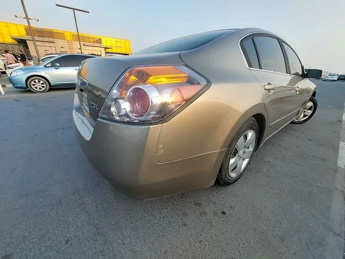Подержанный Nissan Altima IV (L32), 2.5 л, 2009 в Шардже от Al Aqsa Used Cars Золотистый цвет. GCC | AUTO.AE