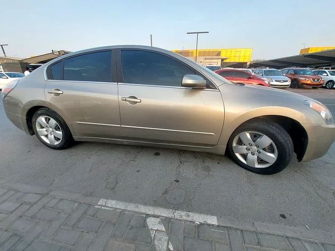 Подержанный Nissan Altima IV (L32), 2.5 л, 2009 в Шардже от Al Aqsa Used Cars Золотистый цвет. GCC | AUTO.AE