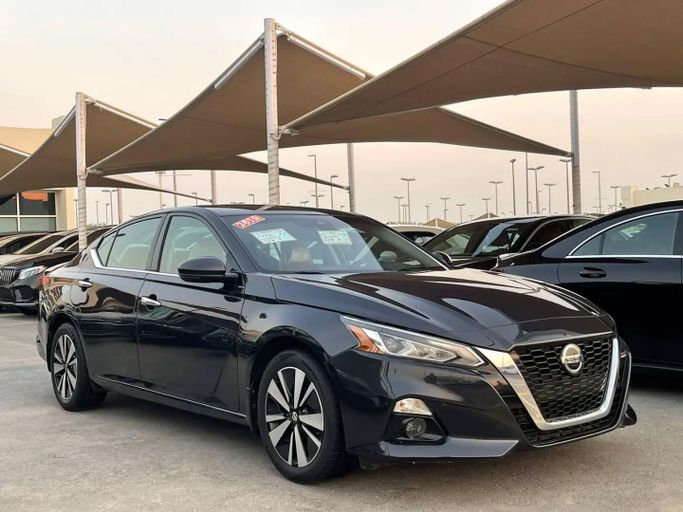 Used Nissan Altima VI (L34), 2.5 l, 2019 in Sharjah by Al Nukhba Al Malakyah Used Cars, Black color. American Specs | AUTO.AE