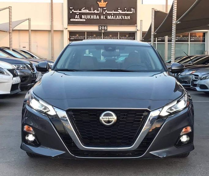 Used Nissan Altima VI (L34), 2.5 l, 2019 in Sharjah by Al Nukhba Al Malakyah Used Cars, Grey color. American Specs | AUTO.AE