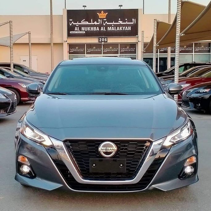 Used Nissan Altima VI (L34), 2.5 l, 2019 in Sharjah by Al Nukhba Al Malakyah Used Cars, Grey color. American Specs | AUTO.AE
