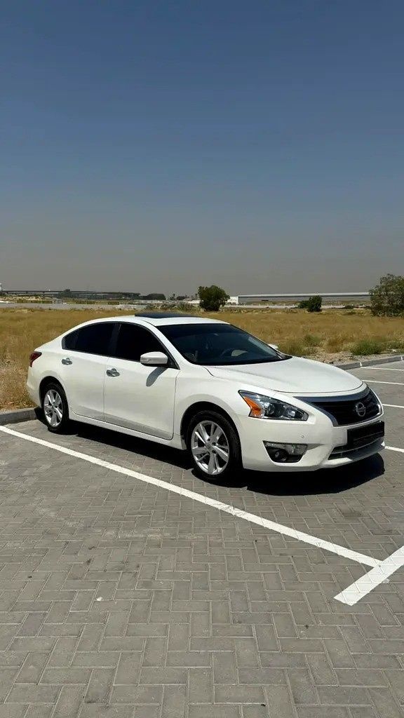 Подержанный Nissan Altima V (L33), 2.5 л, 2015 в Шардже от AL KARADAH USED CARS TRADING Белый цвет. GCC | AUTO.AE | Объявление #271620