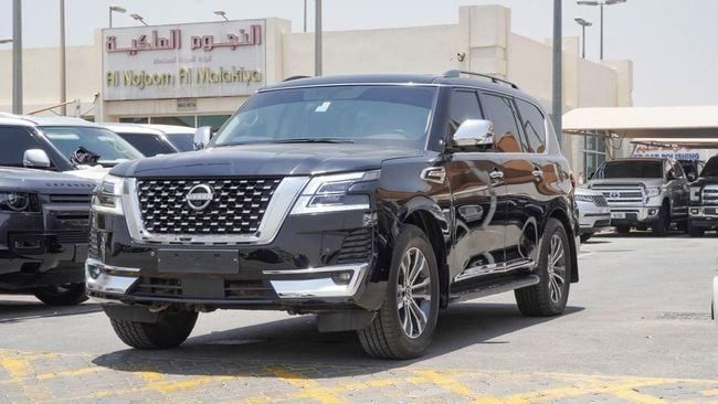 Подержанный Nissan Armada II Рестайлинг, 5.6 л, 2021 в Шардже от Alnujoom Al Malakiah Used Cars Черный цвет. Американская | AUTO.AE