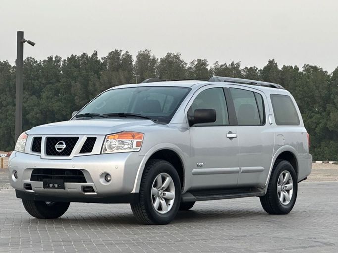 Подержанный Nissan Armada I Рестайлинг, 5.6 л, 2013 в Шардже от Al Aayan Used Cars Серебристый цвет. GCC | AUTO.AE