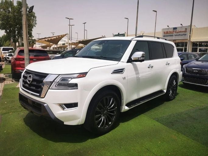 Подержанный Nissan Armada II Рестайлинг, 5.6 л, 2022 в Шардже от Tabarak Used Cars Белый цвет. Американская | AUTO.AE