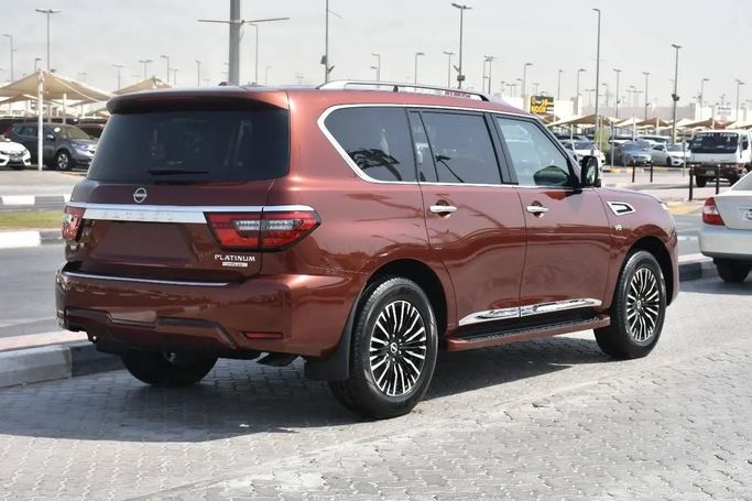 Подержанный Nissan Armada II, 5.6 л, 2018 в Шардже от Alfaris Used Cars Красный цвет. Other | AUTO.AE
