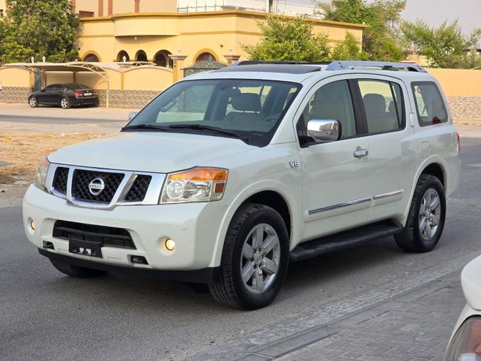 Подержанный Nissan Armada I Рестайлинг, 5.6 л, 2014 в Шардже от Auto Drive Белый цвет. GCC | AUTO.AE