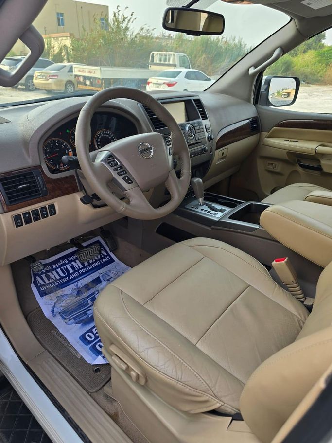 Подержанный Nissan Armada I Рестайлинг, 5.6 л, 2014 в Шардже от Auto Drive Белый цвет. GCC | AUTO.AE
