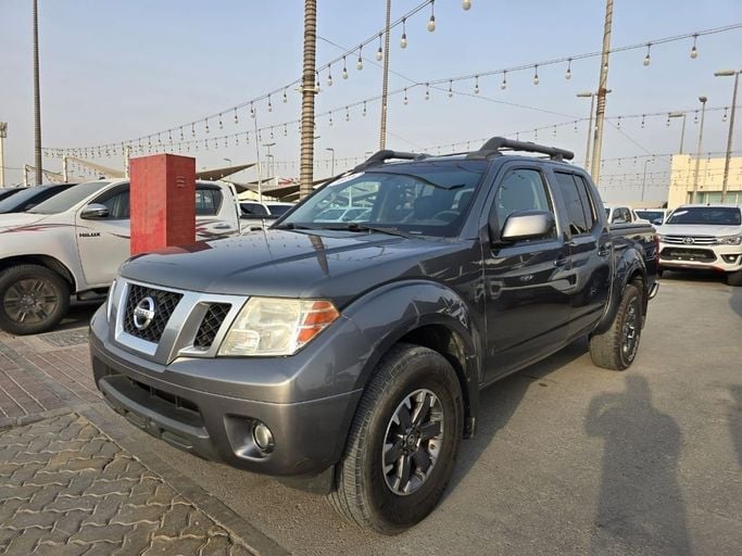 Used Nissan Frontier (Navara) II Facelift, 4.0 l, 2016 in Sharjah by Rebou Najd Used Cars, Grey color. American Specs | AUTO.AE