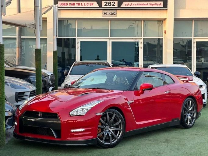 Used Nissan GT-R I Facelift 2, 3.8 l, 2015 in Sharjah by Noor Al Seyoh Used Cars, Red color. American Specs | AUTO.AE