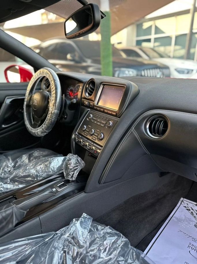 Used Nissan GT-R I Facelift 2, 3.8 l, 2015 in Sharjah by Noor Al Seyoh Used Cars, Red color. American Specs | AUTO.AE