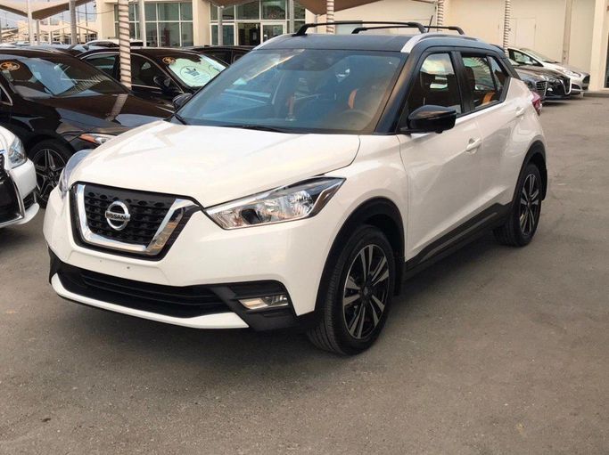 Used Nissan Kicks I, 1.6 l, 2019 in Sharjah by Al Nukhba Al Malakyah Used Cars, White color. American Specs | AUTO.AE