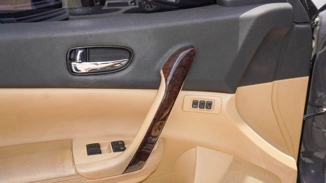 Подержанный Nissan Maxima VII (A35), 3.5 л, 2010 в Шардже от Alnujoom Al Malakiah Used Cars Серый цвет. GCC | AUTO.AE