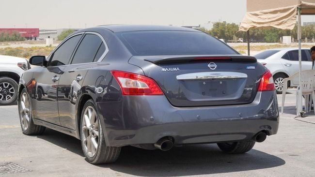 Подержанный Nissan Maxima VII (A35), 3.5 л, 2010 в Шардже от Alnujoom Al Malakiah Used Cars Серый цвет. GCC | AUTO.AE
