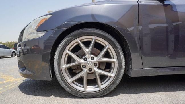 Подержанный Nissan Maxima VII (A35), 3.5 л, 2010 в Шардже от Alnujoom Al Malakiah Used Cars Серый цвет. GCC | AUTO.AE