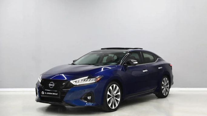 Подержанный Nissan Maxima VIII (A36) Рестайлинг, 3.5 л, 2023 в Шардже от Al Qassem Cars Trading Синий цвет. GCC | AUTO.AE