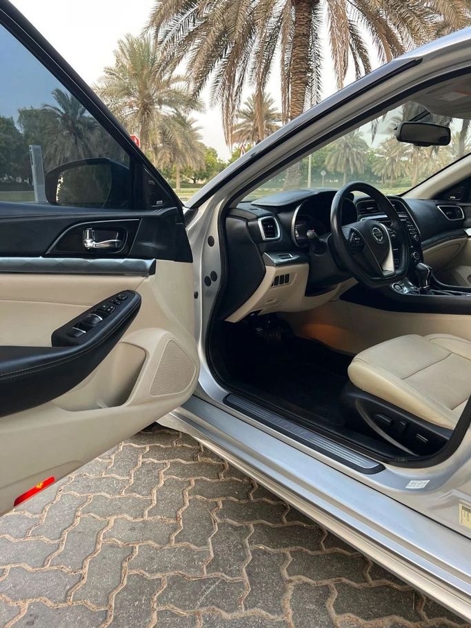 Подержанный Nissan Maxima VIII (A36) Рестайлинг, 3.5 л, 2019 в Шардже от Titanium Used Cars Серебристый цвет. GCC | AUTO.AE