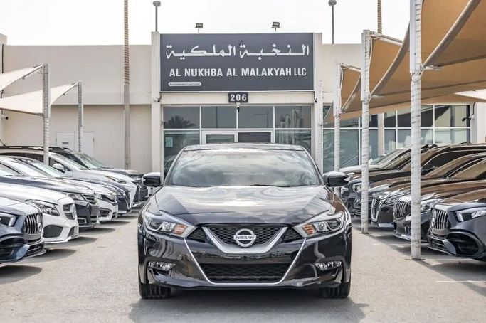 Подержанный Nissan Maxima VIII (A36) Рестайлинг, 3.5 л, 2016 в Шардже от Al Nukhba Al Malakyah Used Cars Коричневый цвет. Американская | AUTO.AE