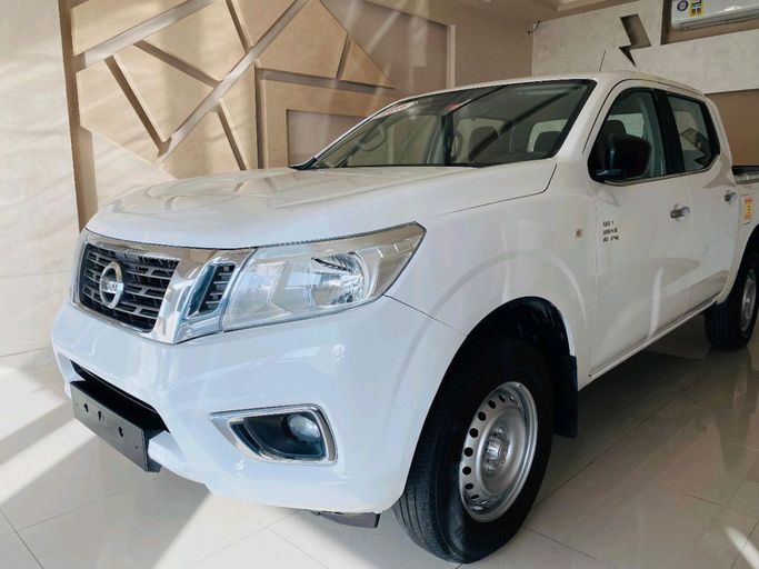 Подержанный Nissan Navara (Frontier) IV (D23), 2.5 л, 2019 в Шардже от Alhamoor Used Cars Белый цвет. GCC | AUTO.AE