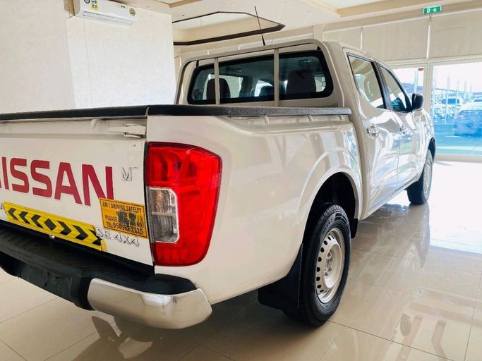 Подержанный Nissan Navara (Frontier) IV (D23), 2.5 л, 2019 в Шардже от Alhamoor Used Cars Белый цвет. GCC | AUTO.AE