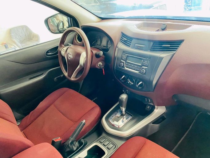 Подержанный Nissan Navara (Frontier) IV (D23), 2.5 л, 2019 в Шардже от Alhamoor Used Cars Белый цвет. GCC | AUTO.AE