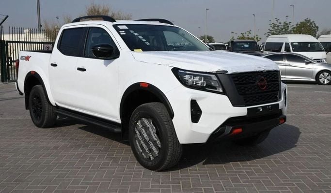 New Nissan Navara (Frontier) IV (D23), 2.5 l, 2025 in Sharjah by Nour Alnukhba Motors, White color. Other | AUTO.AE