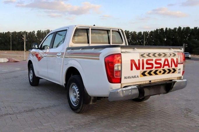 Подержанный Nissan Navara (Frontier) IV (D23), 2.5 л, 2022 в Шардже от Al Sayed Khamis Used Cars Белый цвет. GCC | AUTO.AE